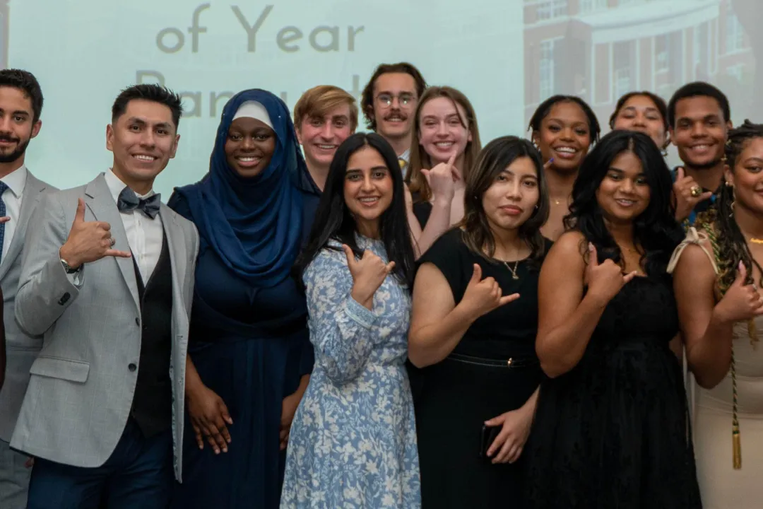 Student Government Association members smiling in formal wear