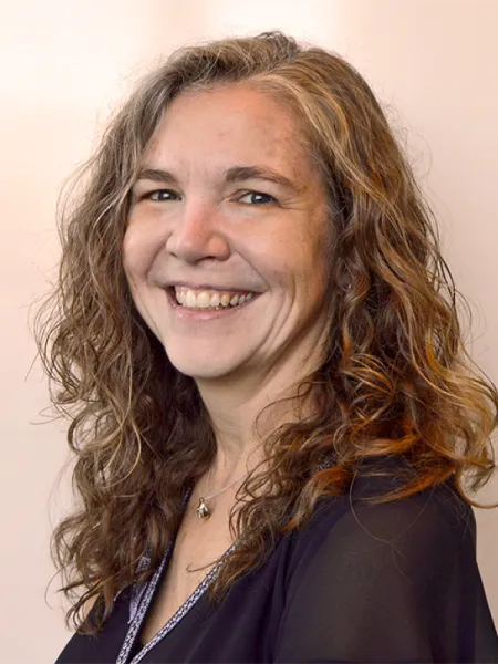 Karen Shaffer smiling in a black shirt