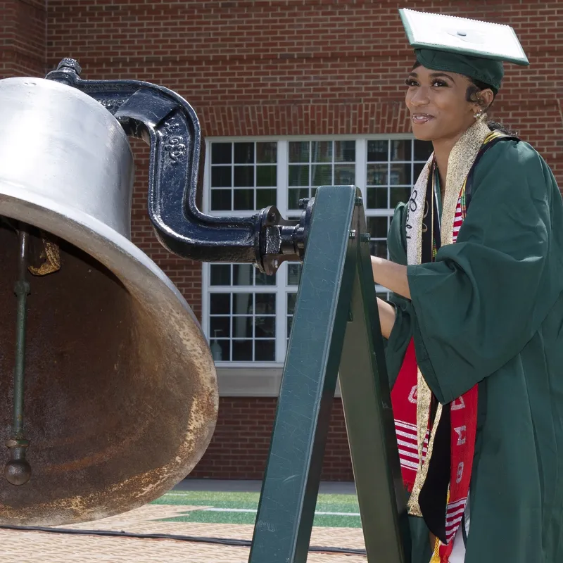 Golden Niner Ryen Boleware participating as a Bell Ringer