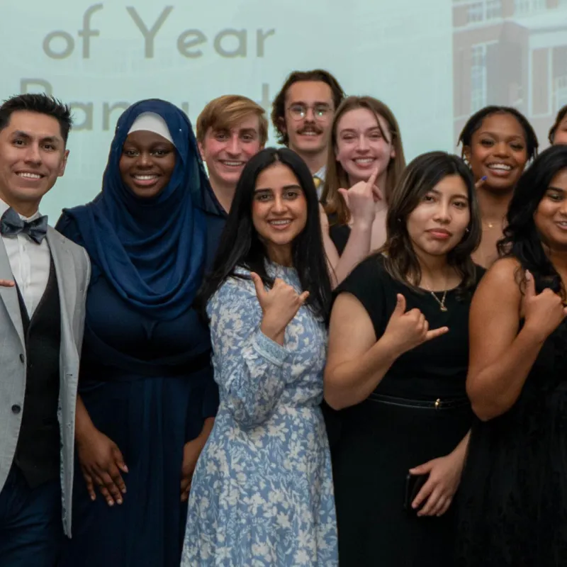 Student Government Association members smiling in formal wear